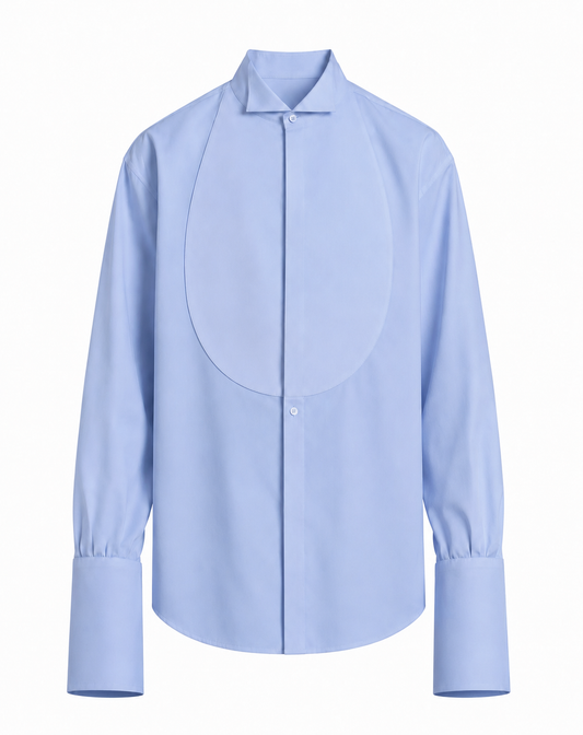 A light blue long-sleeve button-up shirt with a unique structured collar and a large, integrated oval yoke panel on the chest, displayed against a solid white background.